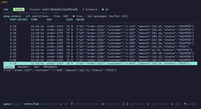 The ntk terminal UI browsing live messages on an orders topic, with one record's JSON value open in the detail pane